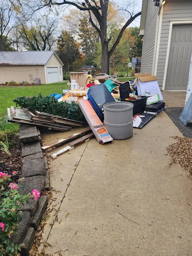 Dumpster being loaded with debris for 30 Yard Dumpster Rental in North Union